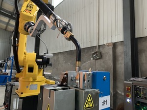 Robotic torch cleaning workstation